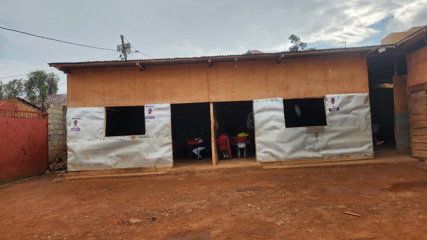 Temporary plywood and iron-sheet classrooms